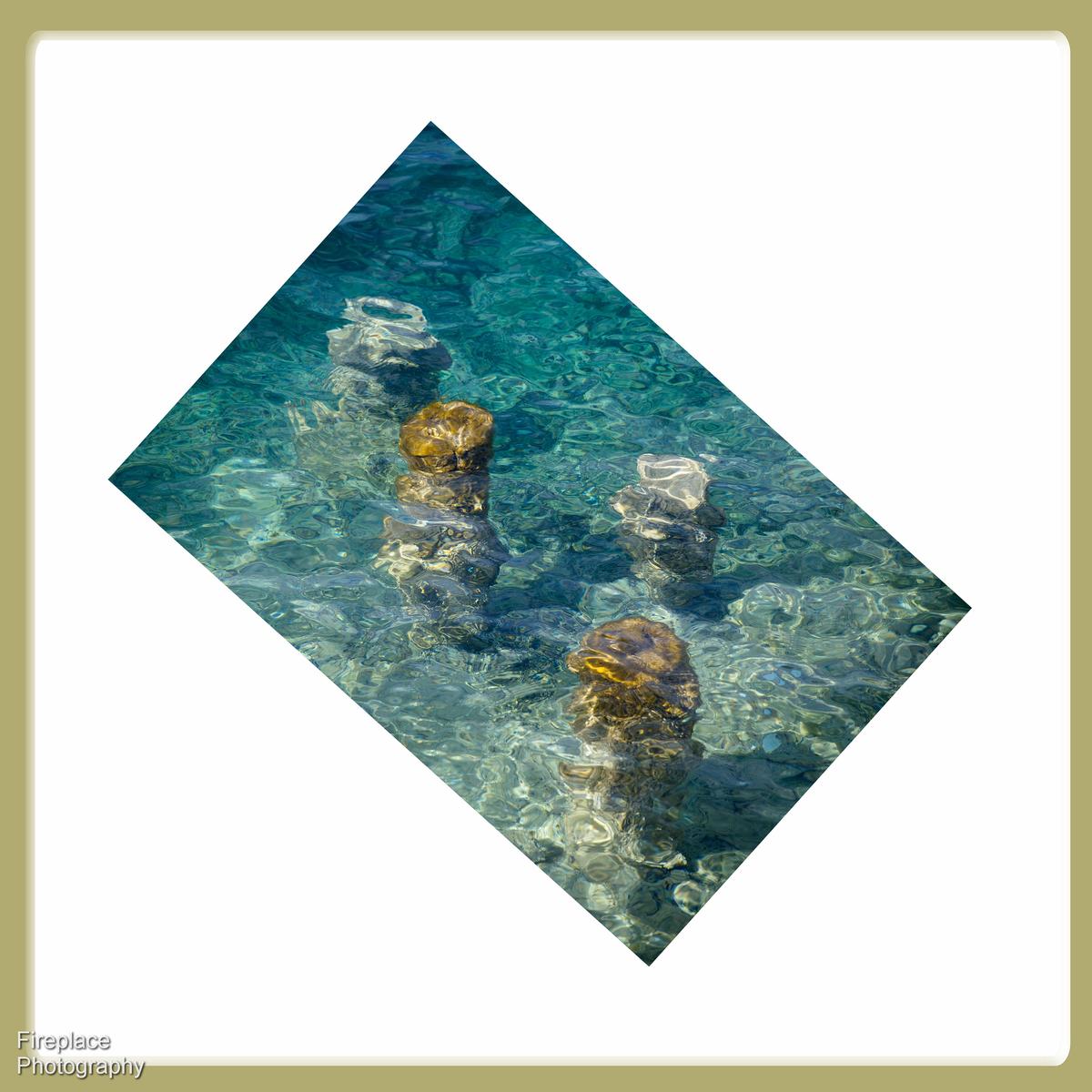 blue water and posts smaller.JPG